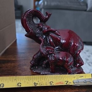 vintage mother and baby elephant red resin figurine. made of resin.